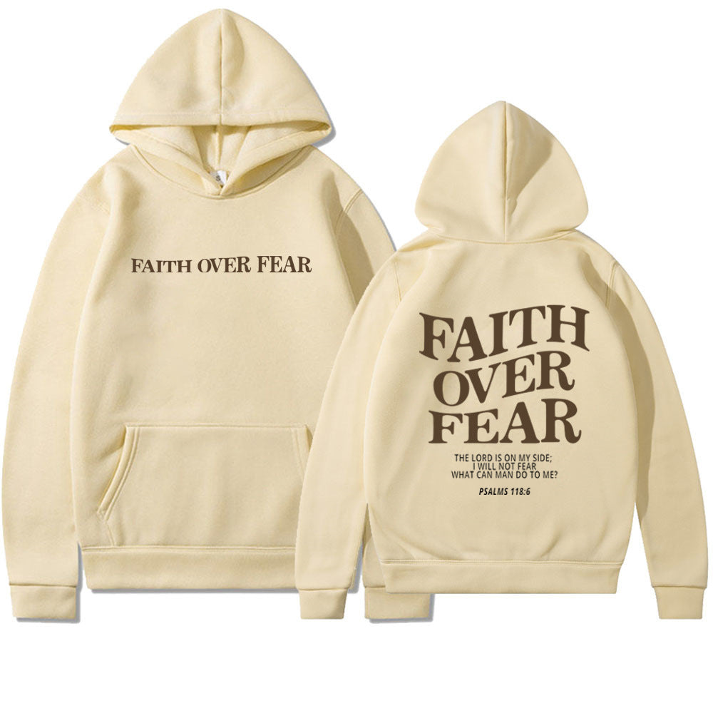 The Faith Over Fear Christian Hoodie features “FAITH OVER FEAR” in small text on the front and large bold letters with Psalms 118:6 and a Bible verse on the back. Trendy, cream-colored, unisex sweatshirt—perfect for sharing your faith in style.